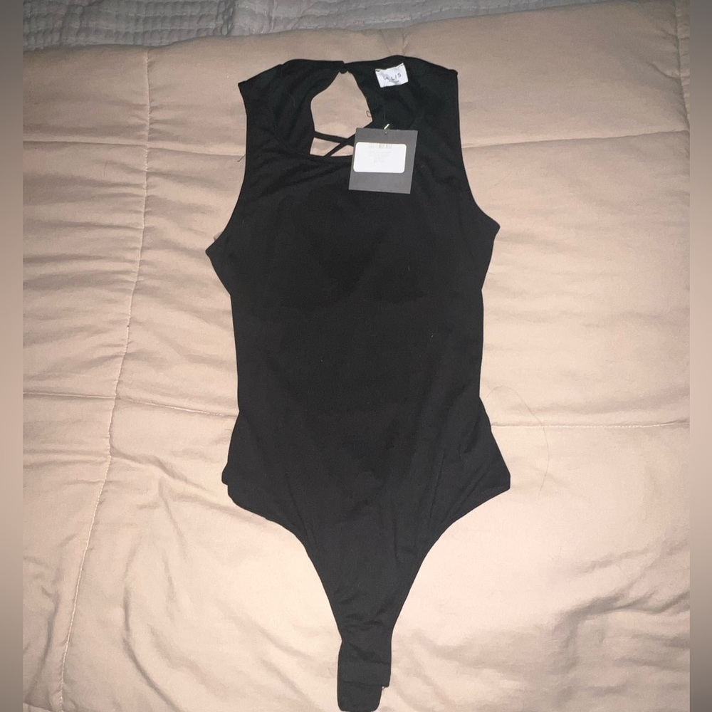 New with tag straps body suit